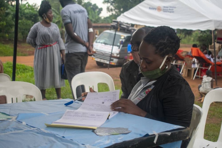 Community registration at a Held at Heart Uganda mobile outreach — Kitetika-Mbazzi and field camps, Wakiso.